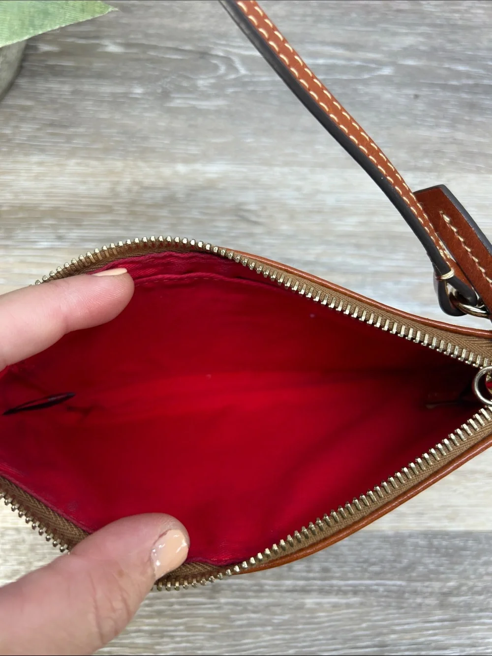 3661 Dooney & Bourke Brown Leather Wristlet with Red Lining 053661